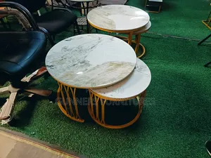 Twin Marble Coffee Tables.