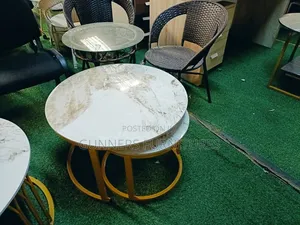 Twin Marble Coffee Tables.