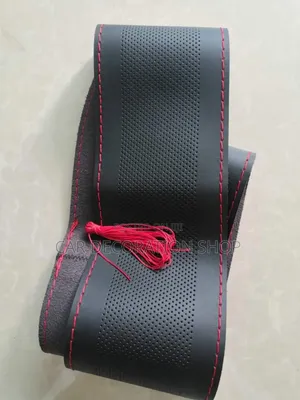 Perforated Leather Steering Cover With Stitching Kneedle