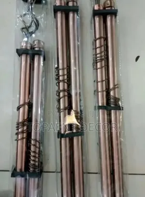 Brown Adjustable Curtain Rods With Curtain Rings