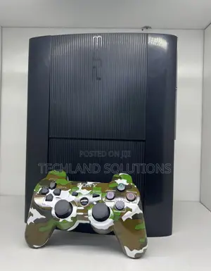 Sony Ps3 + ,Camouflage Pad , 15 Games
