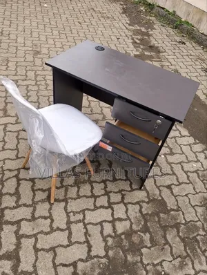 White Eames Chair and 0.9 Study Table
