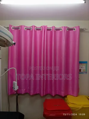 Fold-Forming Short Pink Window Curtains With Rings