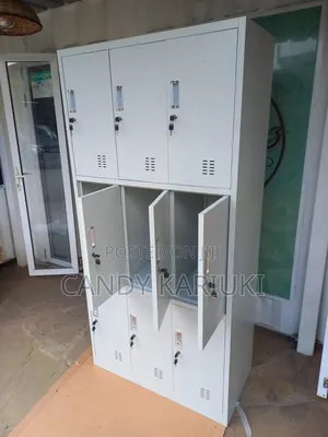 Warehouse Staff Changing Lockers With 9 Compartments