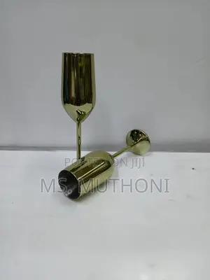 A Pair Of Gold Stainless Steel Wine Glass