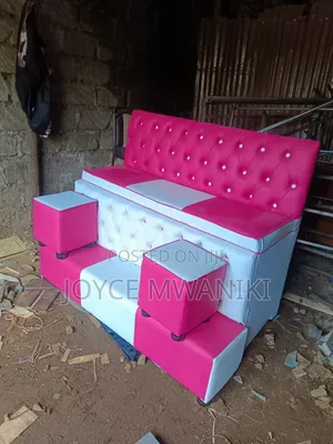 Pedicure Seat 3 Seater, Pink and White With Square Poufs.