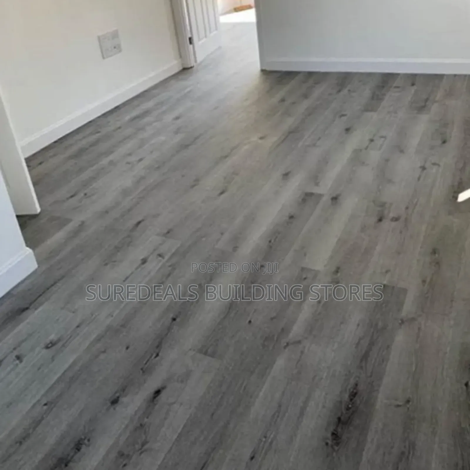 Grey SPC Flooring Interlocking Planks.