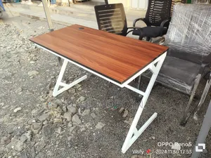 White Metallic Stand With a Brown Top