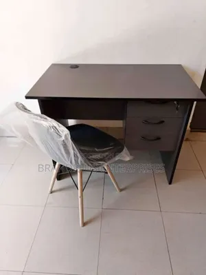 Gray Desk and Eames Chair