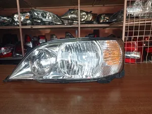 Left Side Ex-Japan Vista Nonzenon Headlight