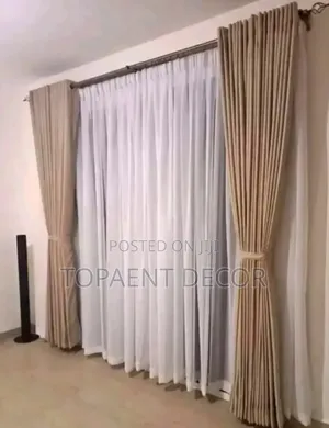 Beige Eyelates Window Curtains and White Sheers