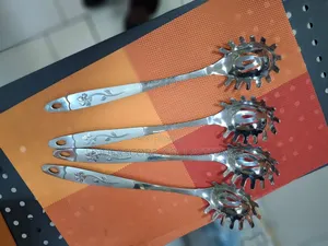 Stainless Steel Rake. Spoon Like Shape.