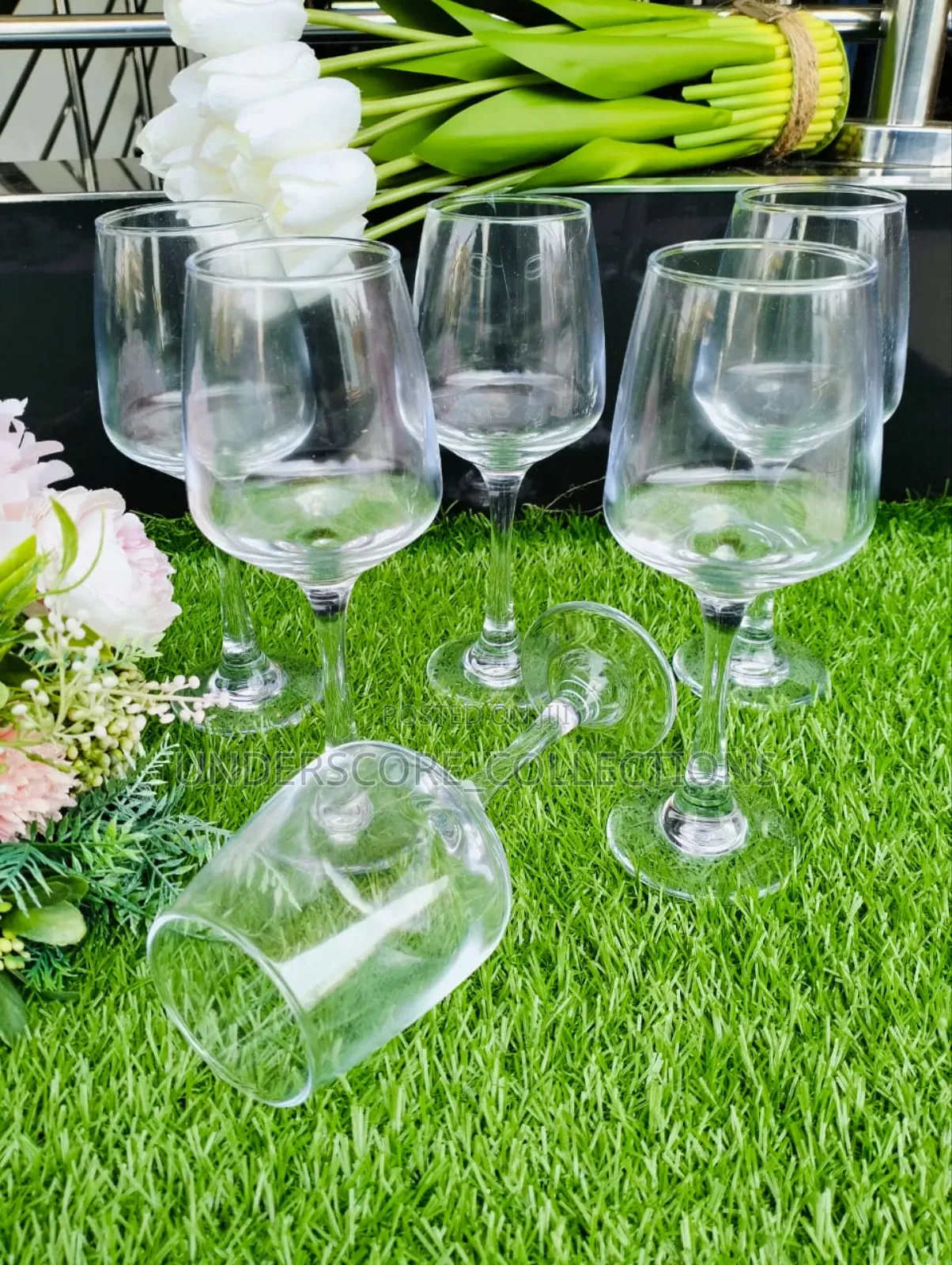 *A Set of 6 Wine Glasses.