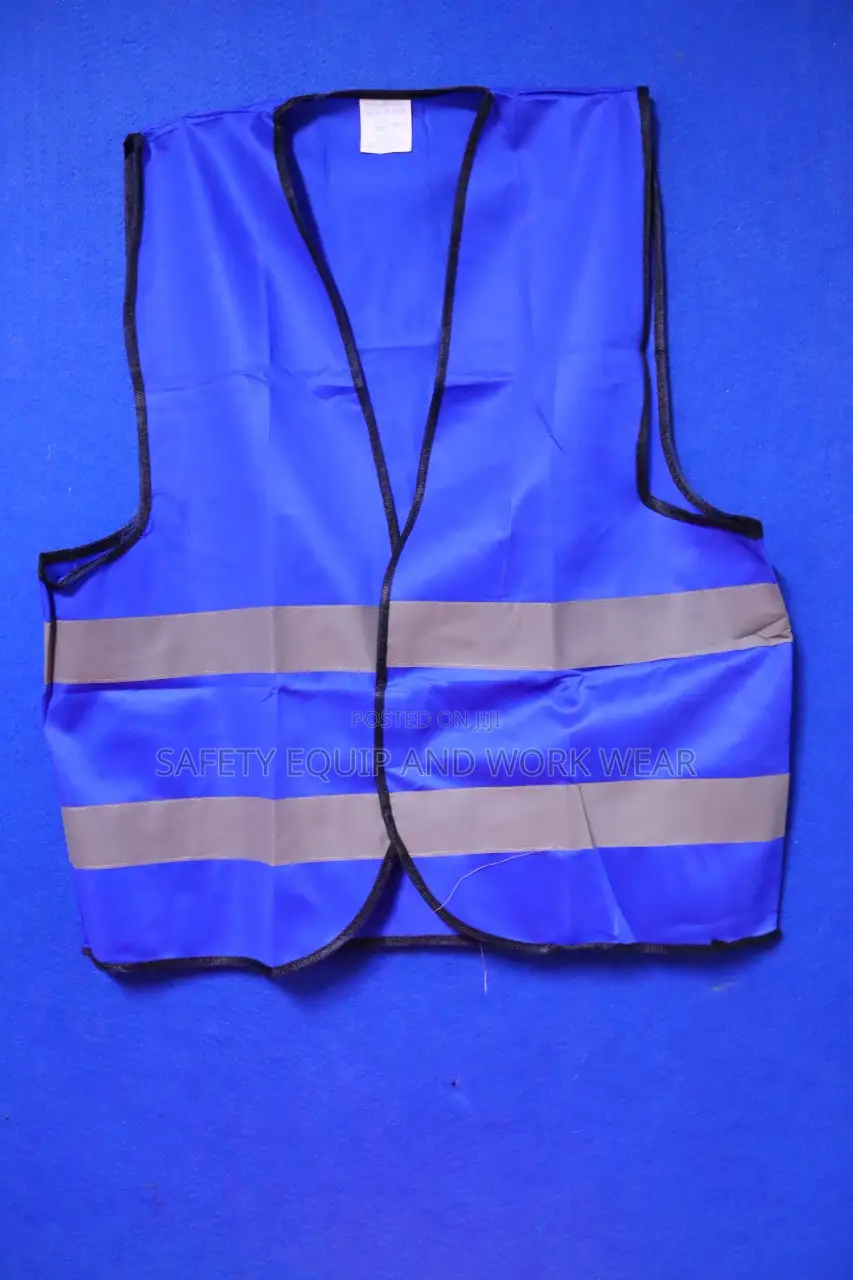 Reflective Vest With A Black Piping.