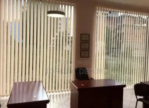 Cream Wall to Wall Vertical Office Blinds