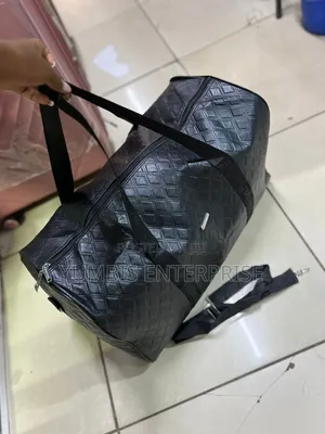 Black Travel -Leather-Material Quality Bags Kes 1600