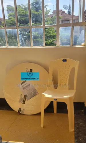 Cream Plastic Chair and a Table Set