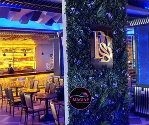 Beautiful Green Wall Panels With Decor Plants