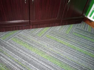 Green and Shed of Grey Carpet Tiles