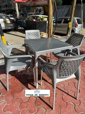 4 Plastic Chair With Metal Tubing +1 Gray Plastic Table