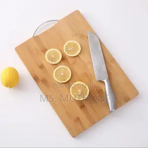 Heavy Wooden Chopping Board With Metallic Handle.