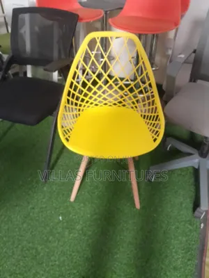 Yellow Mesh Eames Chair