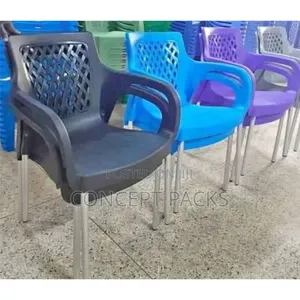 Comfortable Complast Plastic Chairs With Metal Tubing Legs.