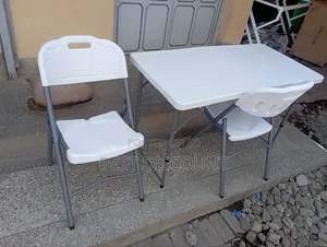 Foldable Table and Chairs (With 2 Chairs.)