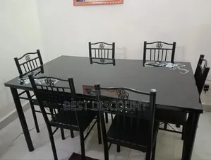 Six Seater Glass Dinning Table and Chairs