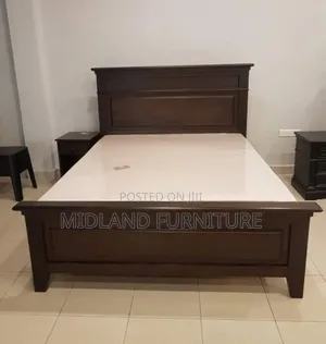 5 by 6 Wooden Brown Bed