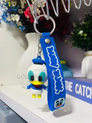 Cute Daisy Duck Cartoon Themed Key Chains/ Key Holders