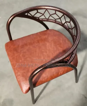 Restaurant Chairs With Metallic Laser Cut Design.