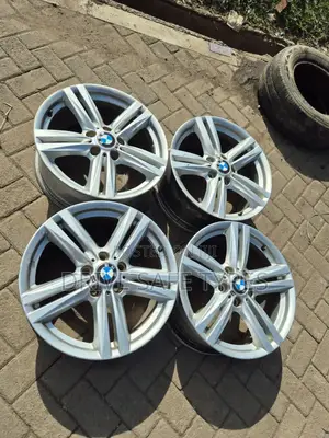 16 Inch BMW Silver Original Rims Set
