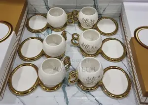 Cup and Saucer Set With Shell Design