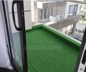 Green Grass Carpet at Home Balcony Space