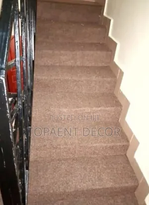 Brown Airbnb Staircase Wall to Wall Carpets