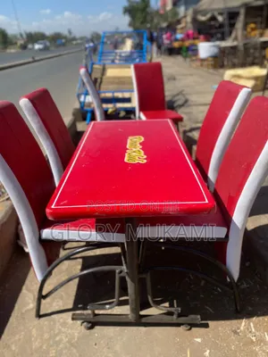 Red Executive Chairs With White Strip and Table