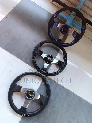 Race-Ready Precision: Momo Sport Steering Wheel