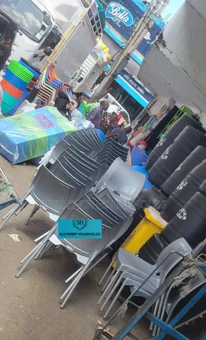 Armless Plastic Chairs With Metal Tubing Legs on Stock Now