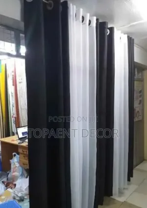 Black Eyelates Curtains and White Eyelates Sheers