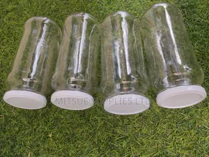 A Set of 12 Glass/Spice Jars 580ml Long With Black/White Lid