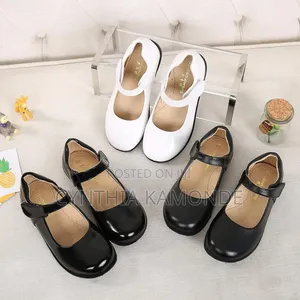 White and Black Kids Do Shoes