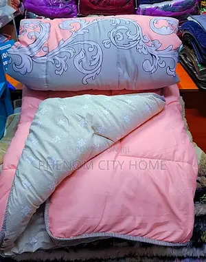 Pinkish Binded Cotton Duvets Available