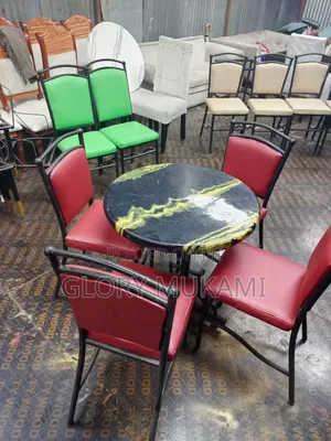 Black Round Marble Table And Restaurant Chairs