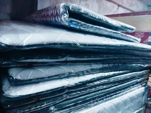 Mattress Toppers With Elastic Rubber Band Underneath.