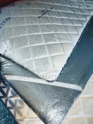 Mattress Toppers With Elastic Rubber Band Underneath.