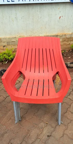 Large Plastic Chair With Metal Tubing Legs