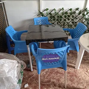 Blue Plastic Chairs With a Square Plastic Table