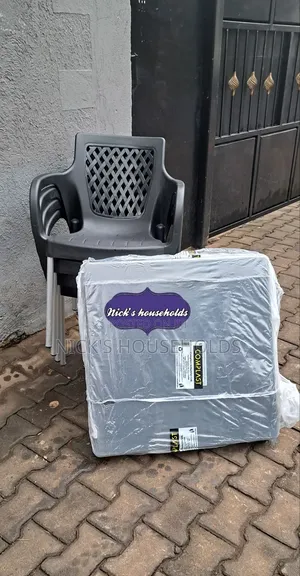 Black Square Table With 4 Plastic Chairs With Metal Legs