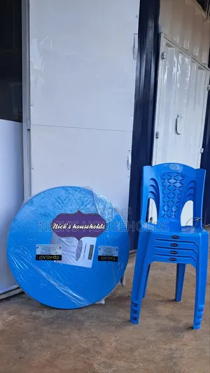 Blue Plastic Chair With a Round Plastic Table
